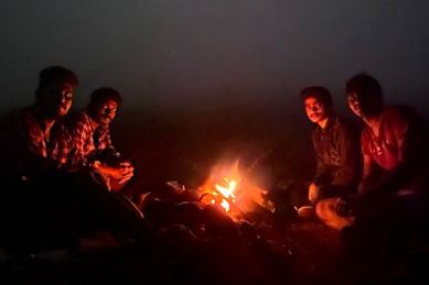 Bonfire at night on the Gudisa hill station camping tour