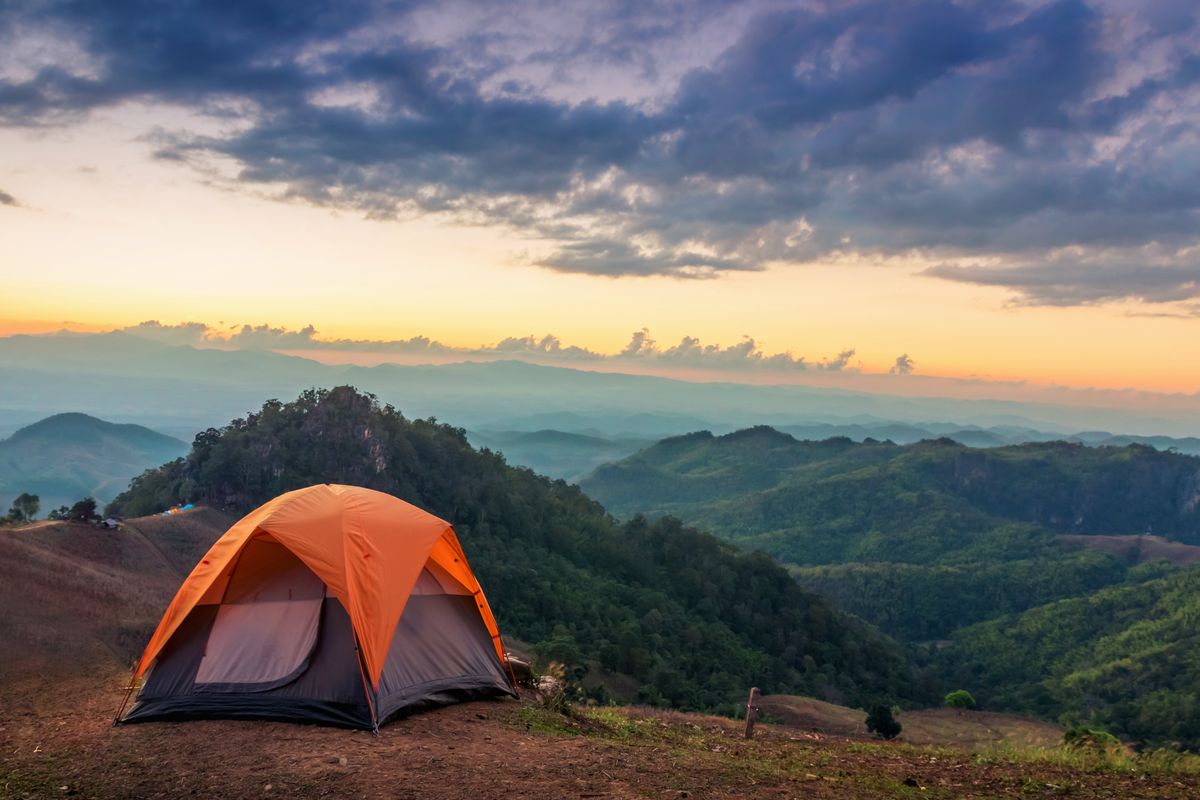 Camping tent at sunset on the Gudisa hill station tour package from Maredumilli