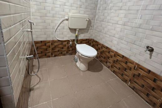 Attached bathroom at Manyam Resorts Maredumilli