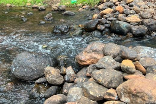 Rocky stream in the forest near Manyam Resorts Maredumilli